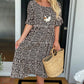 Midi-jurk met ronde hals en stippenprint