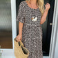 Midi-jurk met ronde hals en stippenprint