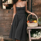 Mouwloze midi-jurk met corset-pasvorm