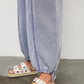 Dames jumpsuit van denim met diepe V-hals