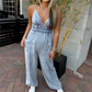 Dames jumpsuit van denim met diepe V-hals