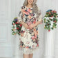 Elegante damesjurk met losse rozenprint