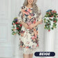 Elegante damesjurk met losse rozenprint