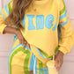 Dames tweedelig set met kleurrijke print: sweatshirt en joggingbroek