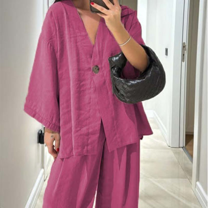 🔥2025 Nieuw binnengekomen - 50% UIT🌺Eenkleurige 2-delige set voor dames: top met V-hals en broek met wijde pijpen