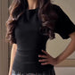 Slim-fit top met korte mouwen en vetersluiting aan de achterkant