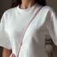 Slim-fit top met korte mouwen en vetersluiting aan de achterkant