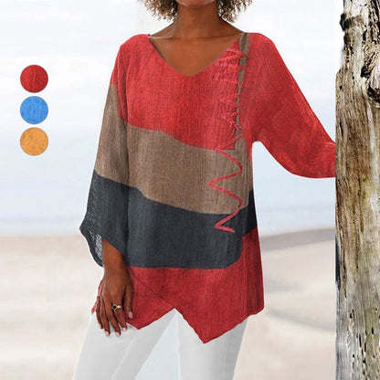 Elegante casual damesblouse met V-hals, lange mouwen en artistiek patroonprint