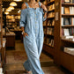 👗👖 Jumpsuit met open schouders, wijde pijpen en zakken