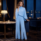 Set voor dames bestaande uit een elegante cape-top met hoge kraag en een broek met wijde pijpen