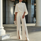 Set voor dames bestaande uit een elegante cape-top met hoge kraag en een broek met wijde pijpen